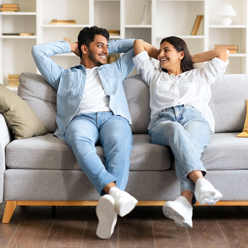 Couple sitting on sofa